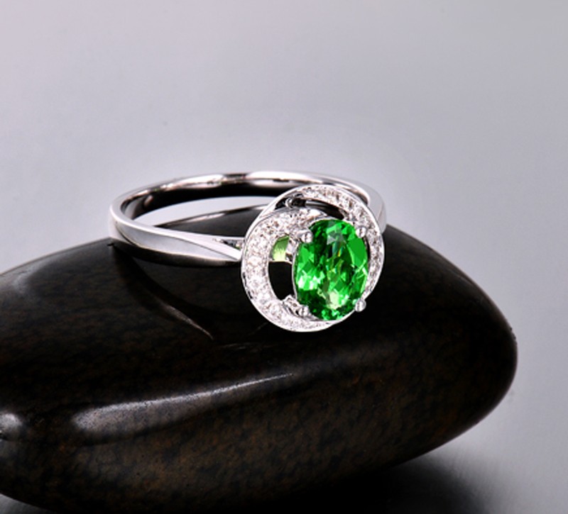 Unique 1 Carat Emerald and Diamond Halo Engagement Ring  